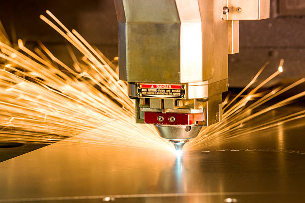 A photograph of a metal, laser-cutting machine.